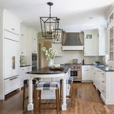 It has a luxurious look, and it contrasts well with white cabinets. 75 Beautiful White Kitchen With Granite Countertops Pictures Ideas March 2021 Houzz