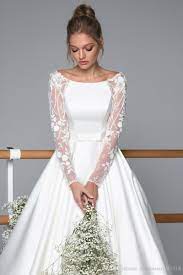 Discount Satin 2020 A Line Boho Wedding Dresses Lace Appliqued Long Sleeve Sweep Train Beach Simp Wedding Gowns Online Wedding Dress Guide Wedding Dresses Lace