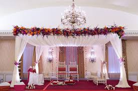 The theme was 'bollywood through the decades' and it was brought to life with a stunning set up inspired by broadway theatre. Indian Inspiration Bollywood Themed Wedding Ideas Equally Wed Modern Lgbtq Weddings Lgbtq Inclusive Wedding Pros