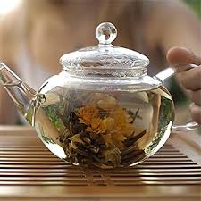 There are 6 flowering tea ball for sale on etsy, and they cost £15.93. The Exotic Teapot Flowering Tea Sampler Tin 10 Varieties Of Blooming Tea All Different Flavours Jasmine Tea Vacuum Sealed Flower Tea Balls Amazon Co Uk Grocery