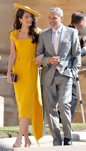 The international human rights lawyer, who attended the nuptials at windsor castle with her husband, actor george clooney, wowed in a canary yellow stella mccartney dress with a. Amal Clooney S Royal Wedding Dress Is Finally Available To Buy Online Daily Mail Online