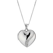 Small but sturdy, delicate but robust, this gold locket necklace is the perfect size to carry a meaningful, nostalgic photo or trinket with you all day. 9ct White Gold Diamond Set Heart Locket Ernest Jones