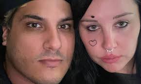 Amanda Bynes Face Tattoo Above Eyebrow