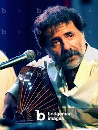 Image of Top Arab composer Marcel Khalife plays his Oud, a forerunner