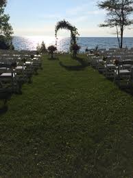 A Stunning Outdoor Water View Wedding Ceremony In Door County Wisconsin By Door County Ev Luxury Wedding Venues Wedding Photo Albums Wedding Officiant Script