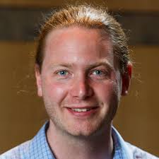 A Bayesian Multivariate Functional Dynamic Linear Model