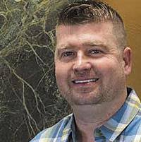 Montrose dentist takes pride in fatherhood, helping others