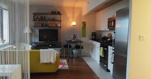 One Room Living A Really Attractive Multipurpose Kitchen Living Room Bedro Living Room And Bedroom Combo Tiny Living Rooms Living Room And Kitchen Design