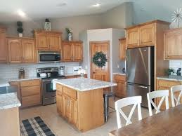 The flooring is a real white oak flooring, stained a dark walnut color and sealed. 7 Kitchen Backsplash Ideas With Maple Cabinets That Do It Right