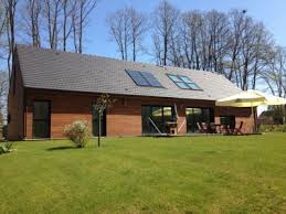 Maison ossature bois plain pied toit plat. Comment Choisir Sa Maison A Ossature En Bois Guide Complet Hellopro