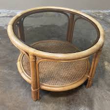 A glass coffee table makes for an elegant, subtle addition to the room, while a coffee table with storage is perfect for creating space for a striking centerpiece. Mid Century Rattan Coffee Table With Glass Top