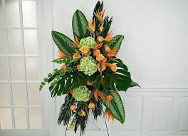 Green And Orange Includes Birds Of Paradise And Bells Of Ireland Funeral Flower Arrangements Funeral Flowers Funeral Floral