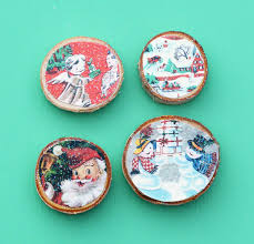 Press firmly to secure it to the wood, and smooth out any air bubbles. Wood Slice Christmas Magnets From Vintage Cards Mod Podge Rocks