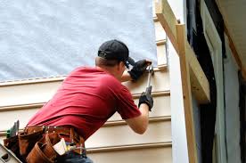 Remove the nails on the lap board then use the claw of the hammer to split the board down the center (image 1). Diy Siding Vs Hiring A Professional Pros Cons