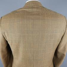 Soft jackets are tailored for a deconstructed look that might be thought of as night out attire. Brioni 40 Regular Gold And Navy Plaid Wool Sport Coat For Sale At 1stdibs