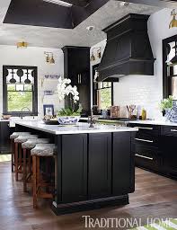 Kitchens appear in a range of styles, from traditional to sleekly minimalist. 10 Kitchens With Black Appliances In Trending Design Ideas For Your Kitchen Modern Black Kitchen House And Home Magazine Traditional Home Magazine
