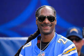 Kansas AD apologizes after basketball event featuring Snoop Dogg, stripper  poles