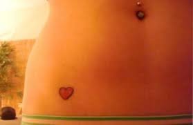 The sky is the limit for getting these hip designs done; Red Heart Tattoo On Women Hip Bone Tattoo Designs For Women