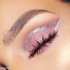 Pink Glitter Eyeshadow Outlined With A Silver Glitter Eyeliner Topped Off With Some Falsies Makeup Eye Makeup Makeup Makeup Looks