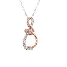From our junior collection solid 10 karat gold and.9 carats of vvs clarity diamond simulants. Diamond 0 25 Ctw Braided Pendant 10 Kt Rose Gold Sterling Silver Quinn S Goldsmith