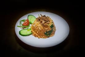 Put in rice and turn the heat on high. Normah Nasi Ayam Penyet Normah Cafe Ayam Penyet Is Also Talk Of London Chicken Marinated In Spices Boiled Deep Fried And Served With Rice Sambal And Cucumber Picture Of Normah S London