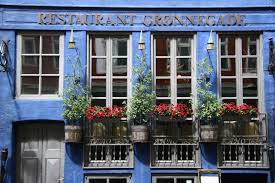 Kopenhagen Kleine Meerjungfrau Im Bunten Hafen Travelsharks Kopenhagen Fassade Palmenhaus