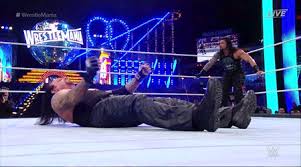 The wrestlemania name itself is written on what appears to be a … Undertaker Aj Match Gif Page 1 Line 17qq Com