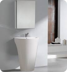 white pedestal sink with medicine cabinet