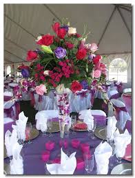 Quinceanera Table Decoration Ideas My Favorite Color Is Purple And I Think It Looks Great On The Table Quinceanera Decorations Quinceanera Flower Centerpieces