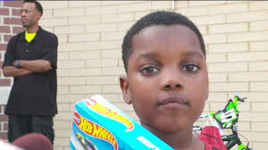 Look what I got you:' Community steps up with gifts for 8-year-old boy shot 