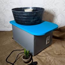 So here's another splash pan idea, courtesy of ben stark pottery brent wheels have a metal plate under the wheel head. Homemade Pottery Wheel Potrepots