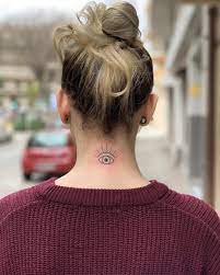 60 Back Of The Neck Tattoos That Are Easy To Hide And Fun To Show Off Back Of Neck Tattoo Neck Tattoo Fish Tail Side Braid