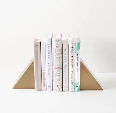 This wood project was made with love with the help of my frie. Diy Triangle Bookends Almost Makes Perfect