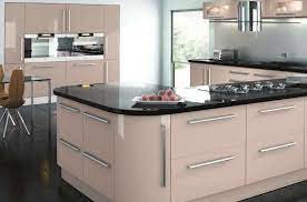 You may already have your other decorative kitchen ideas in place, your wall colors picked out, cabinets designed and an idea of the finish you want from your kitchen worktop, and so which type of countertop material you choose is vital to bring it all to life. Cappuccino High Gloss Kitchen Google Search Kitchen Interior Design Decor Interior Design Kitchen High Gloss Kitchen