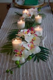 A Closer Look At The Orchid And Palm Centerpiece New Ideas Luau Wedding Wedding Centerpieces Tropical Wedding