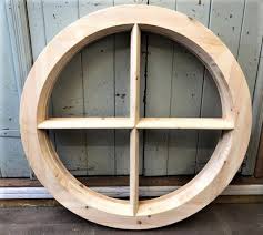While round windows are inspired by rose windows from the gothic architecture, there exists modern round windows that serve the same purposes. Round Wooden Window Wells Reclamation