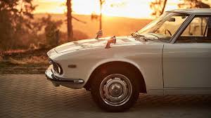 Image result for Sunrise Red 1966 Mazda