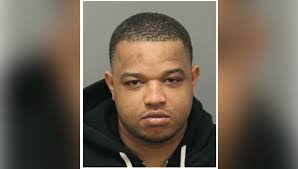 Man arrested after woman taken to hospital following shooting at Raleigh  apartments