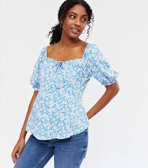 Blue floral pattern womens top. Maternity Pale Blue Floral Tie Front Peplum Top New Look