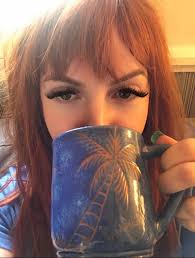 outside the window spider's web in pale sunshine coffee brews