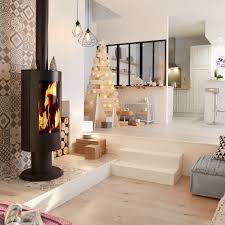 Un Poele A Bois Sureleve Et Melange Aux Carreaux De Ciment Poele A Bois Deco Salon Cocooning Decoration Salon Bois