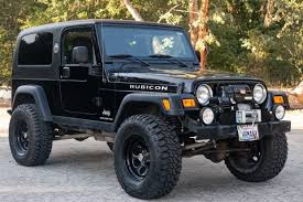 Image result for Brilliant Black 2005 Jeep