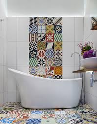 Nickel fixtures and a contrasted, dual sink round out the space. 30 Floor Tile Designs For Every Corner Of Your Home