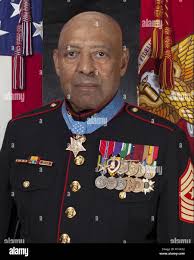 Retired U.S. Marine Corps Sgt.Maj John L. Canley, the 300th Marine Medal of  Honor recipient, poses for a command board photo at the Pentagon in  Arlington, Virginia, Oct. 18, 2018. From Jan.