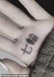She got her first inking in 2012 when she was 18. Ariana Grande Shows Off A Selection Of Her 48 Tattoos As She Flashes Arm Inkings In Sultry Selfie Daily Mail Online