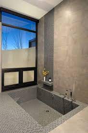 This sunken bathtub, though quite large fits the space and size of this bathroom perfectly. Sunken Bathtub Design Ideas Pictures Remodel And Decor Sunken Tub Sunken Bathtub Contemporary Bathtubs