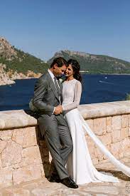 The star studded event on saturday was attended by the king and queen emeritus. See Rafael Nadal S Wife Mery S Hand Embroidered Rosa Clara Wedding Dress Spanish Wedding Stunning Wedding Dresses Celebrity Weddings