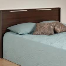 The wood finish of this bed brings in nature's beauty into one's bedroom. Bedroom Prepac Mfg