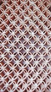 S14 is a similar stoneware body with a coarser grog which is a good choice for larger tiles. Clay Roof Tiles Used As A Wall Moorish In Style Roof Tiles Clay Roof Tiles Brick Design