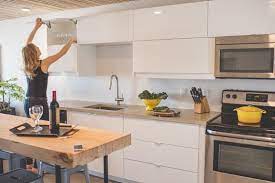 Modern Style Ikea Kitchen In Yellowknife Canada Features White High Gloss Ringhult Doors Stainless St Upper Kitchen Cabinets White Ikea Kitchen Ikea Kitchen